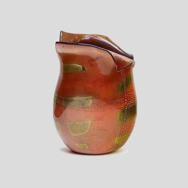 Hand blown burnt orange with gold leaf inclusion Murano glass vase by glass artist Mario Nichetto signed. 1970’s. This...