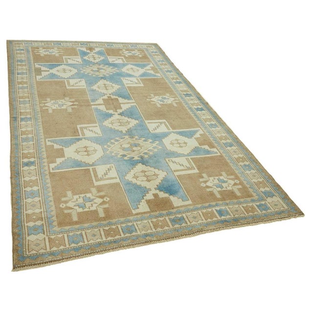 This Turkish handmade Anatolian rug is a timeless piece of craftsmanship, created in the heart of Anatolia, Turkey, a...