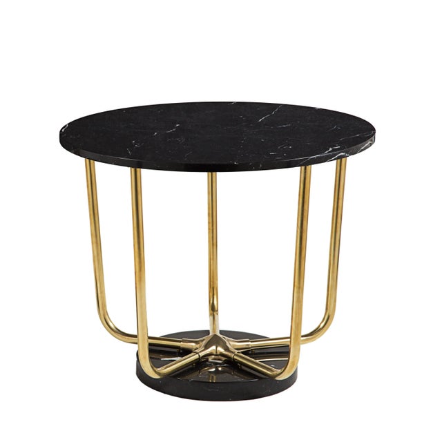 This piece is available separately in different brass and marble finishes.