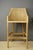 Stools made of a wooden frame and a woven rattan shell