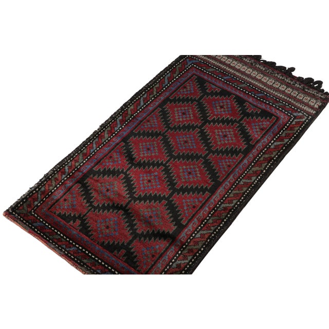 Hand knotted in wool, this 6x8 Baluch rug represents a new line of tribal carpets in the Modern Classics Collection by Rug...