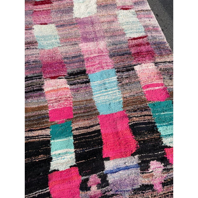 Expert Berber women wove and knotted this style rug using their bare hands. Natural sheep wool made this ancient rug soft...