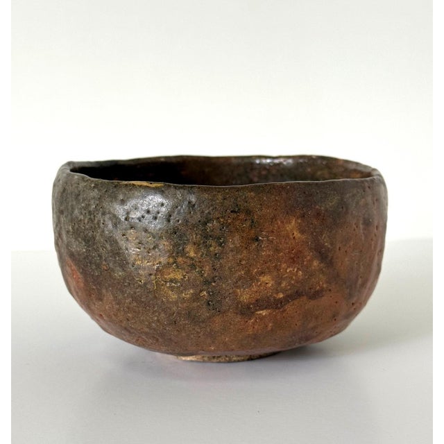 An Aka-Raku Chawan (red-glazed tea bowl) by Raku Tannyu (1795-1854), the tenth-generation head of the Raku kiln. The Raku...
