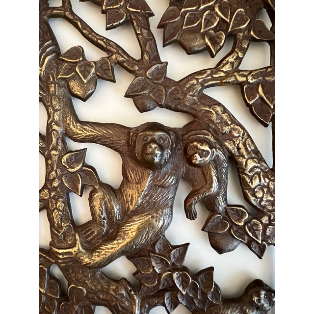 Asian Brass Metal Climbing Monkeys Wall-Hanging Plaque. Stunning dark brass patina finish with golden highlights. The....