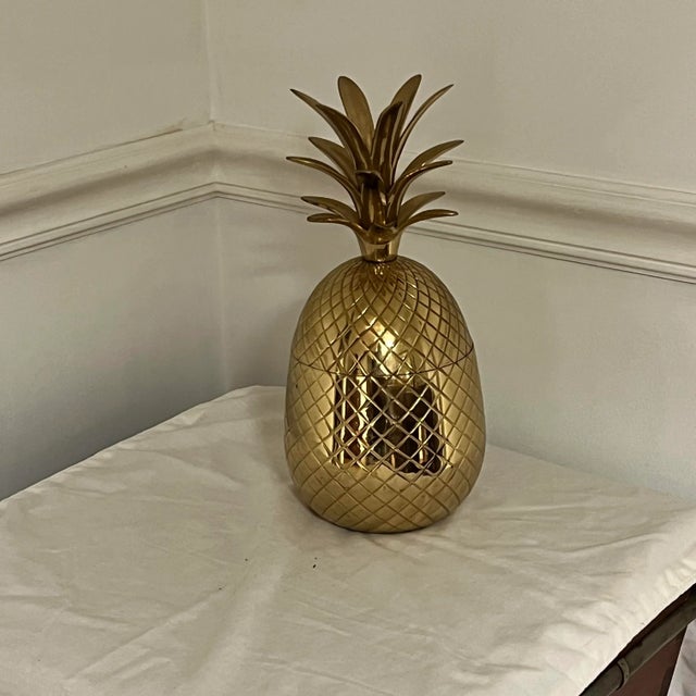 Vintage brass pineapple jar. Bright and shiny, ready for use. Measures 6.5” diameter x 12.5” h.