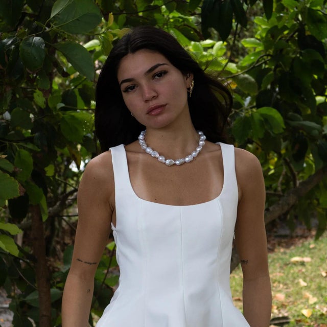 Discover the beauty of imperfection with our Timeless Grace Baroque Pearl Necklace -a luxurious choker designed to stand...