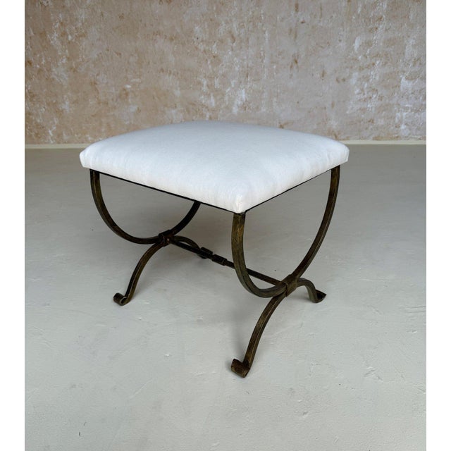 This elegant small scale Spanish gilt iron bench was recently crafted by skilled European artisans using traditional iron-...