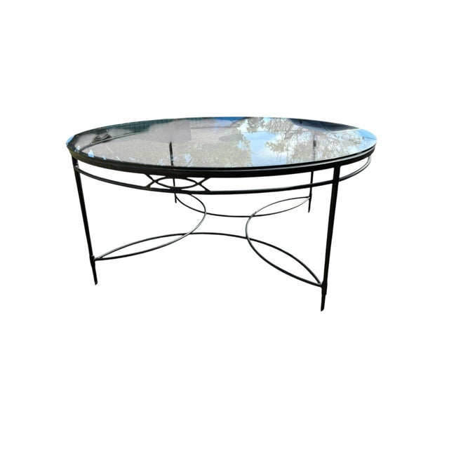 A Janus Et Cie patio dining set from their Amalfi collection. Features six round back armchairs in slate, with a 64" round...