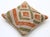 A one-of-a-kind handwoven Afghan wool kilim accent pillow featuring concentric diamond in terracotta and olive. Cut and...