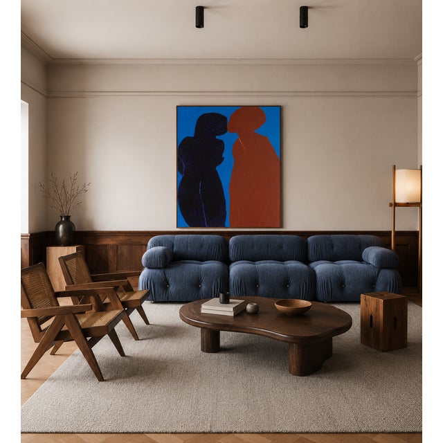 Two figures lean towards each other in an almost suspended movement. No precise details, no defined faces: only a...