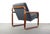 Walnut and brass fitted chair w/ gray tweed upholstery w/ a tufted back detail.