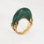 Distinct and elaborate vintage malachite ring (circa 1970s) crafted in 14 karat yellow gold. Malachite measures 23.5mm x...