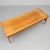 Johannes Andersen teak coffee table for Trensum. Tabletop built on a sculpted stand, made of teak, mahogany and walnut...