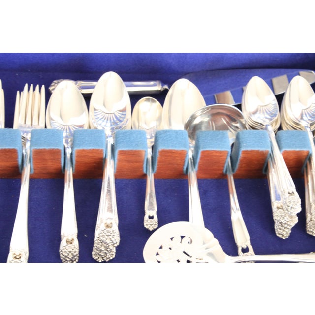 1937 "First Love" pattern floral and line design (80 piece) flatware set in original box. William Roger Mfg. Co. This set...