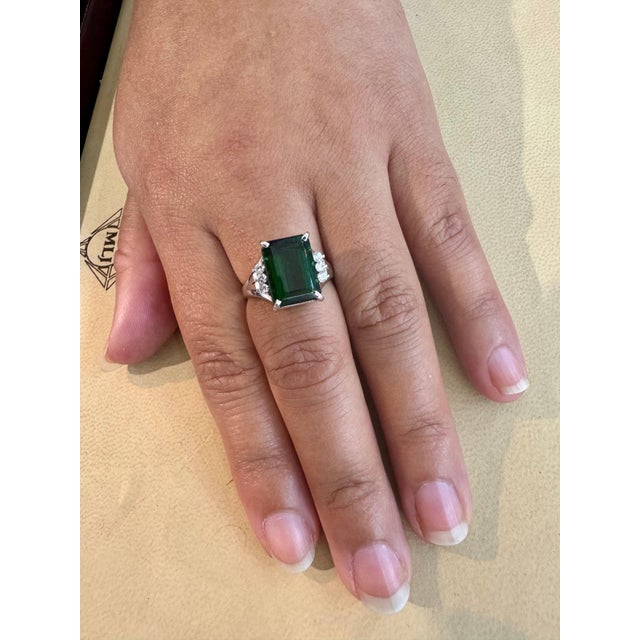 5.2 Carat Emerald cut Green Tourmaline & 0.15 Carat Diamond Cocktail Ring 14 Karat White Gold Estate This spectacular...