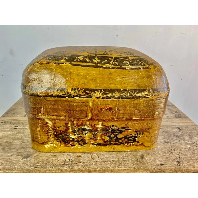 19th century lidded box made from papier-machere.
