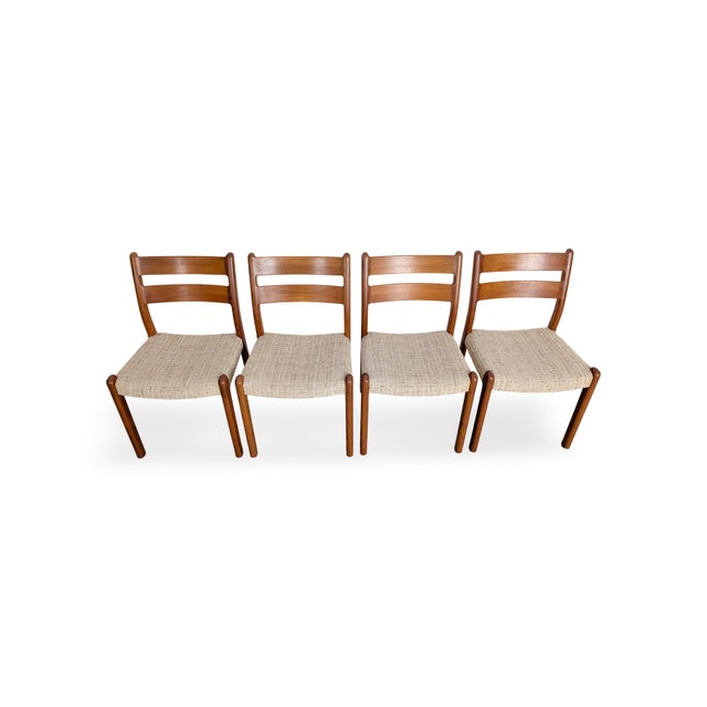 Set of four vintage Danish chairs from the 1960s-70s for sale. These chairs were crafted by EMC Mobler from solid teak and...