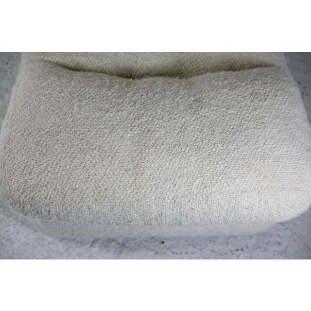 Space Age chair in unbleached wool, France, circa 1970. Wear consistent with age: discrete traces and pilling. Very...