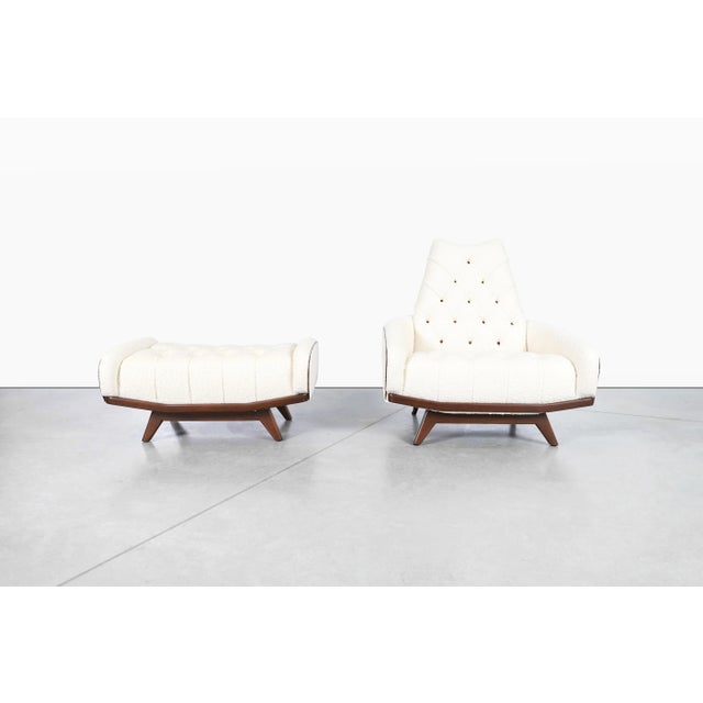 Mid-century modern walnut Gondola lounge chair and ottoman attributed to Adrian Pearsall, manufactured in the United...