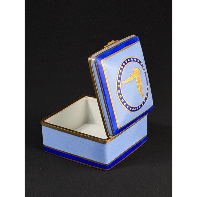 Elegant antique French porcelain box marked “Porcelaine de Paris”, featuring a refined neoclassical design with deep...