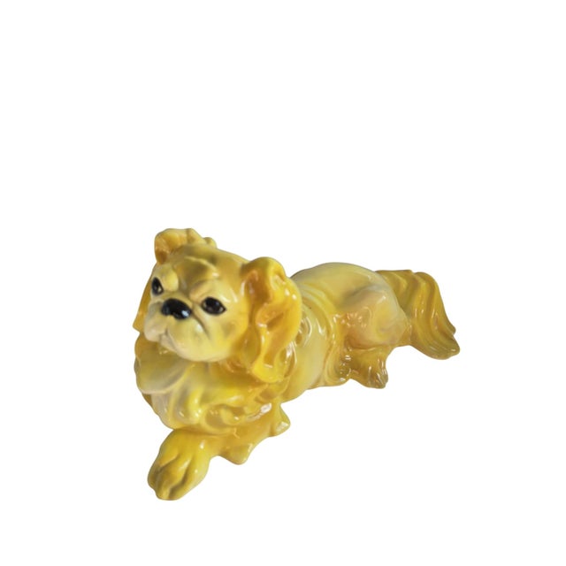 Vintage yellow Pekinese dog figurine by Astoria Moldings Inc, made in Germany, 1960's. Sweet face, sunny yellow color....