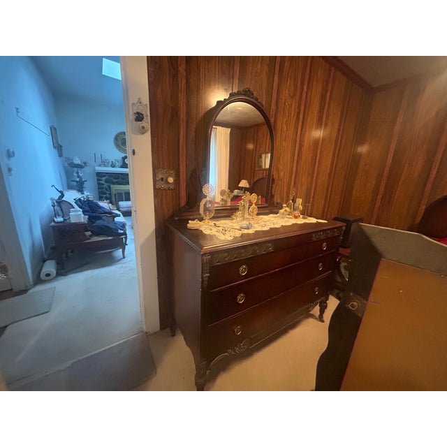 The drawers have a slight outward curve, which was a hallmark of high-quality traditional craftsmanship to add elegance...