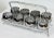 Vintage Mid-Century Modern Dorothy Thorpe style silver fade roly poly glasses in chrome caddy with handle. Set of 8...
