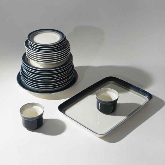 "Eco" dinner service for six, designed by Giovanni Gariboldi for Richard Ginori in the 1970s, is a refined expression of...