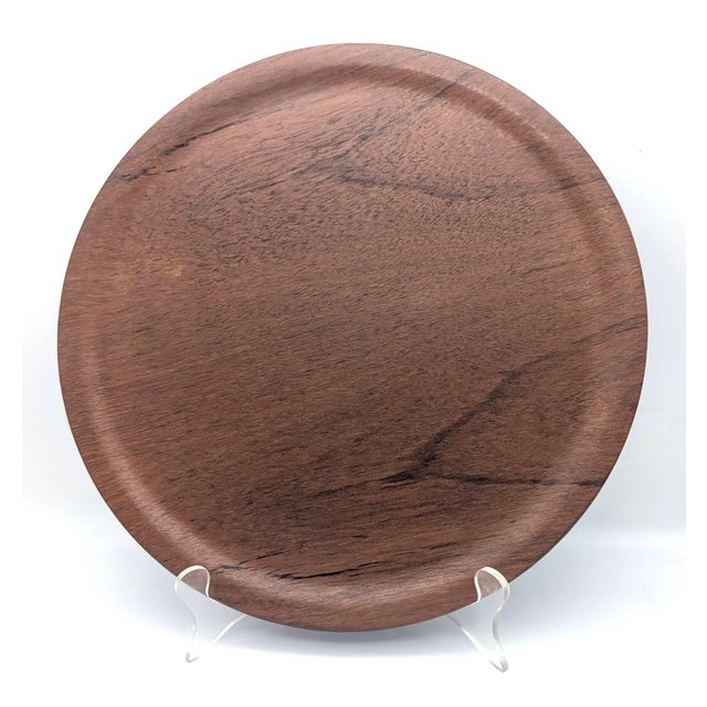 Offered is a mid 20th Century round Teak bentwood tray made in Denmark between the mid 1950s to mid 1960s. It measures 13"...