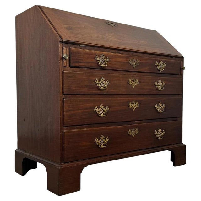 Fine George III Cuban Mahogany Bureau, circa 1760 Material: Cuban Mahogany, Brass A superb mid-18th-century English...
