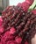 Beautiful pair of vintage curtain tiebacks in rich burgundy silk with hand-strung garnet chip bead tassels. The natural...