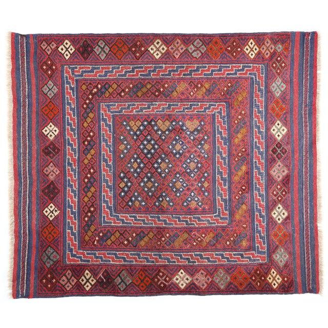 This vintage flatweave kilim & rug together work features a finely balanced geometric composition with layered borders...