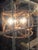 Elevate your space with this stunning set of four Currey & Company "Palm Beach" lanterns (Model 9694). These fixtures...
