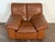 Original brown leather Italian lounge chair in good vintage condition. One repair on the seat cushion (please check all...