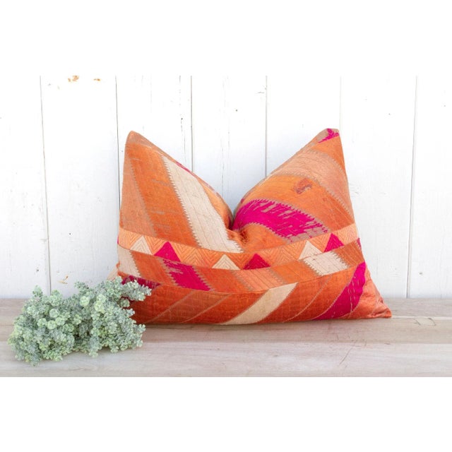 This luxurious Bagh Phulkari pillow features beautiful fine silk embroidery with a diamond pattern on a cotton fabric....