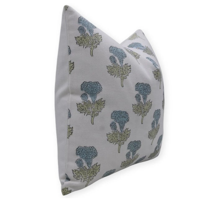 Elevate your living space with the charm of tradition—this block print handmade cushion cover in the 'Manmohan' design is...