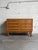 This vintage Danish wooden dresser features an eight-drawer configuration arranged in a dual-column layout. The classic...