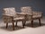 A charming pair of vintage upholstered armchairs from Czechoslovakia, featuring gently angled backs, rounded armrests, and...