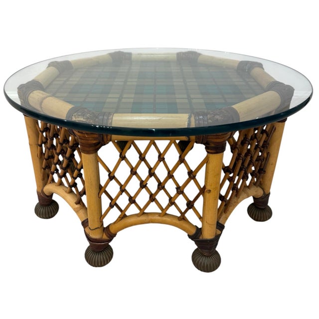 Mackenzie Childs side table. Octagonal shaped rattan table with rattan and base. Sides are criss crossed rattan with...
