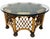Mackenzie Childs side table. Octagonal shaped rattan table with rattan and base. Sides are criss crossed rattan with...