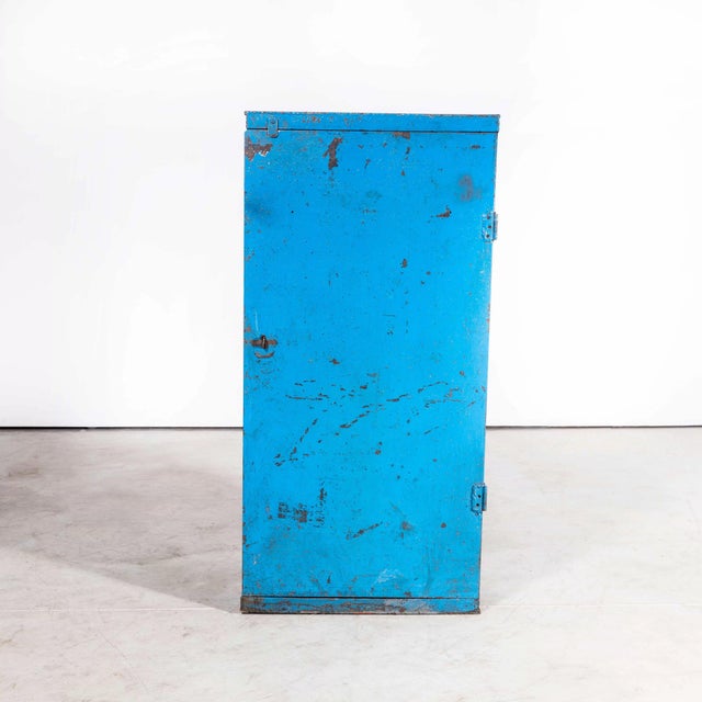 1950’s crude industrial metal storage cabinet – cupboard. Simple heavy duty industrial cupboard sourced from a steel...