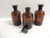 Industrial Vintage Amber Color Glass Pharmacy Apothecary Bottles - Set of 3 For Sale - Image 3 of 5