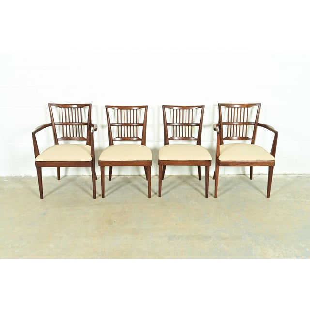 An exceptional set of four Mid-Century Modern spindle back dining chairs In the manner of Paul McCobb USA, Circa 1950s...