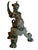 This is an early 19th century bronze whimsy in the baroque style. She is a mermaid with wings has tripod legs with lion...