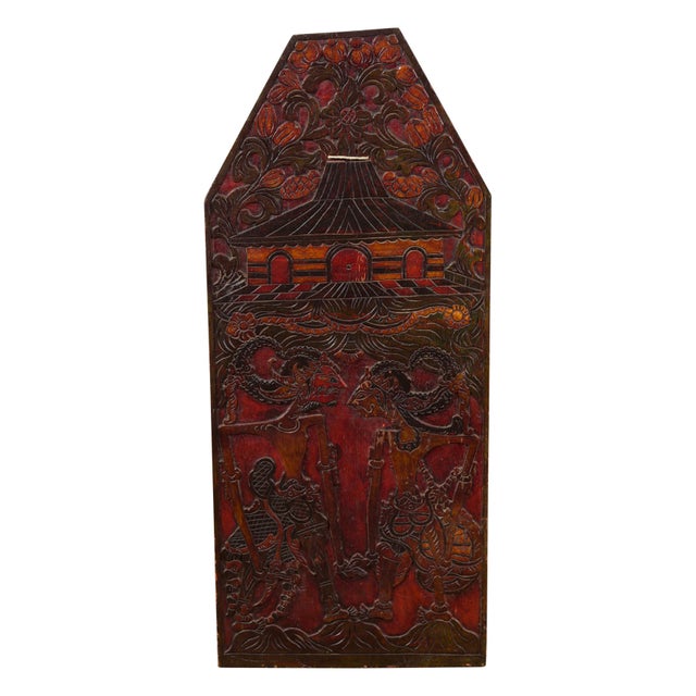 A Burmese hand-carved wooden puppet show sign from the 19th century, with red and black painted accents as well as...