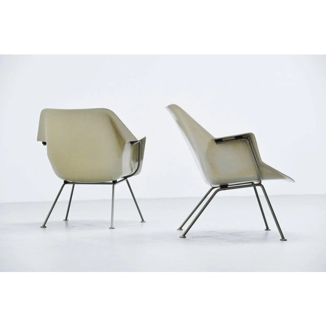 A pair of light grey polyester lounge chairs model No. 416 designed by Wim Rietveld (son of Gerrit Thomas Rietveld) and...