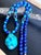 A refined expression of artisan craftsmanship, this one-of-a-kind gemstone necklace combines the rich royal blues of Lapis...