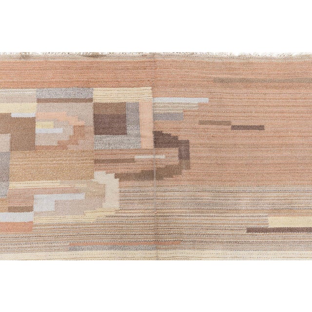 Vintage Swedish Flat-Weave Rug in Earth Tones Size: 6'6" × 9'7" (198 × 292 cm) A remarkable example of Scandinavian...