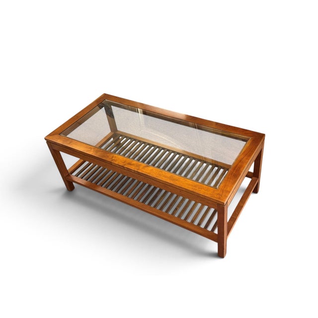 A handsome Stickley coffee table that embodies the enduring appeal of American Mission furniture. Crafted with a rich,...