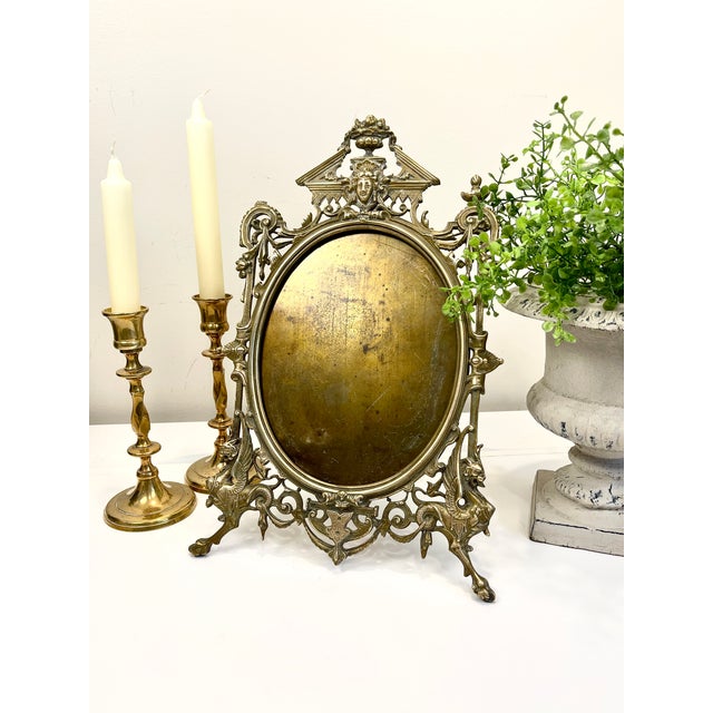 Beautiful antique or vintage ornate solid brass or bronze picture frame with brass backing. It features elaborate...